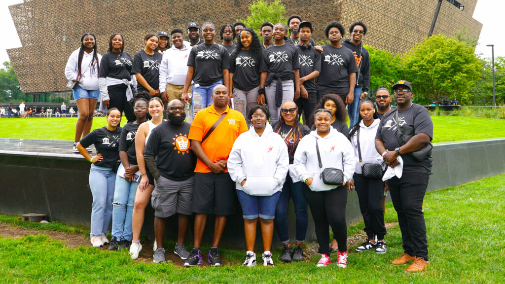 Emmanuel "Dupree" Jackson, Jr. Founder and CEO of EJS Project with his staff and students.